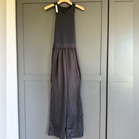 NWT • Victoria Secret VSX Lux Glossy Sport Wide-Leg Black Jumpsuit • S - Picture 1 of 10